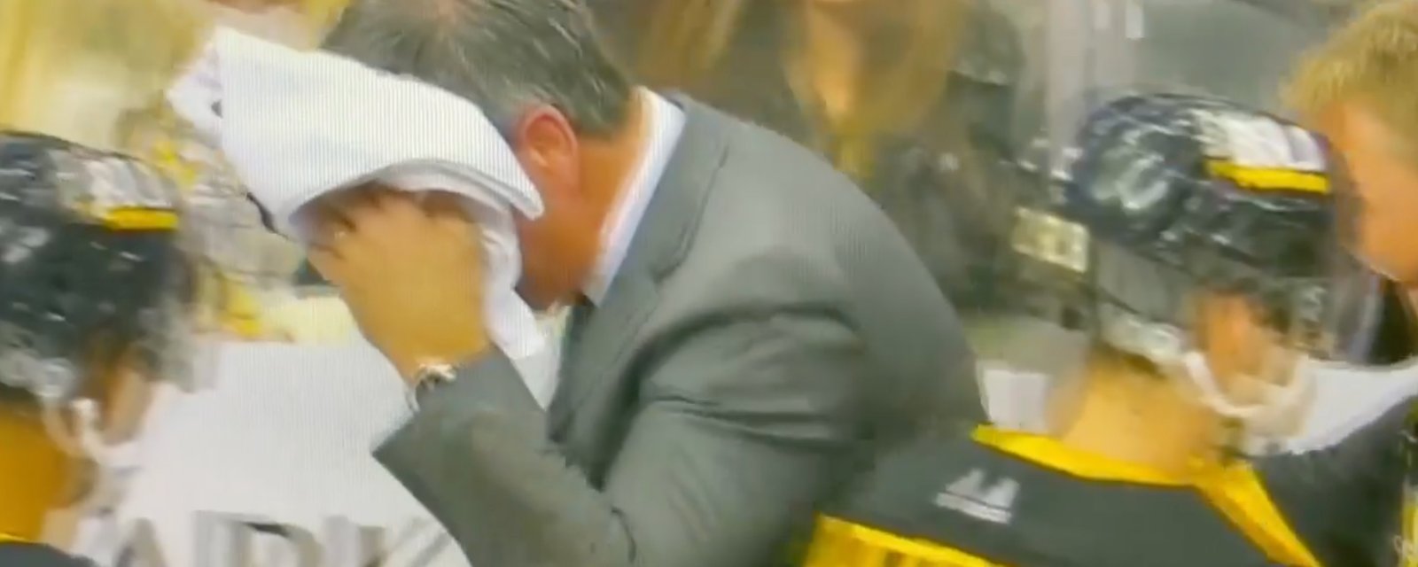 Penguins coach Mike Sullivan bleeds badly after taking puck to the head! 