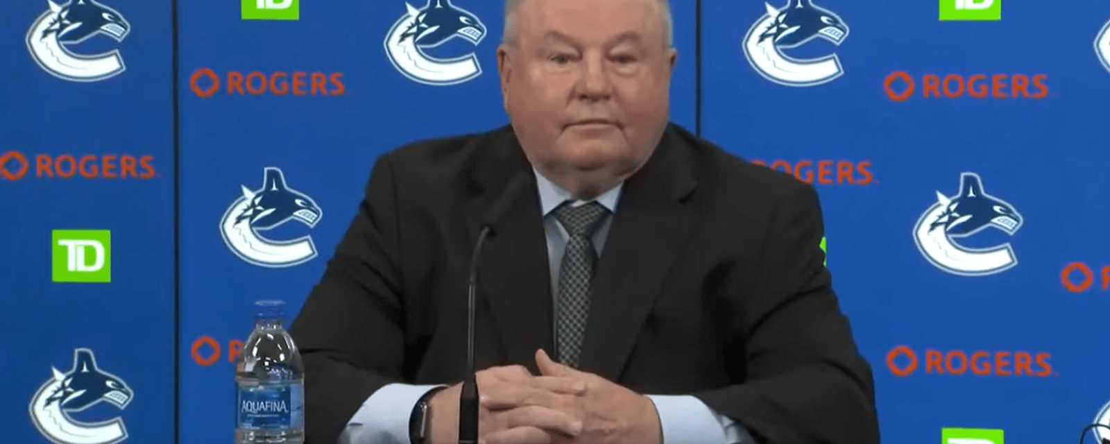 Bruce Boudreau throws Canucks management under the bus.