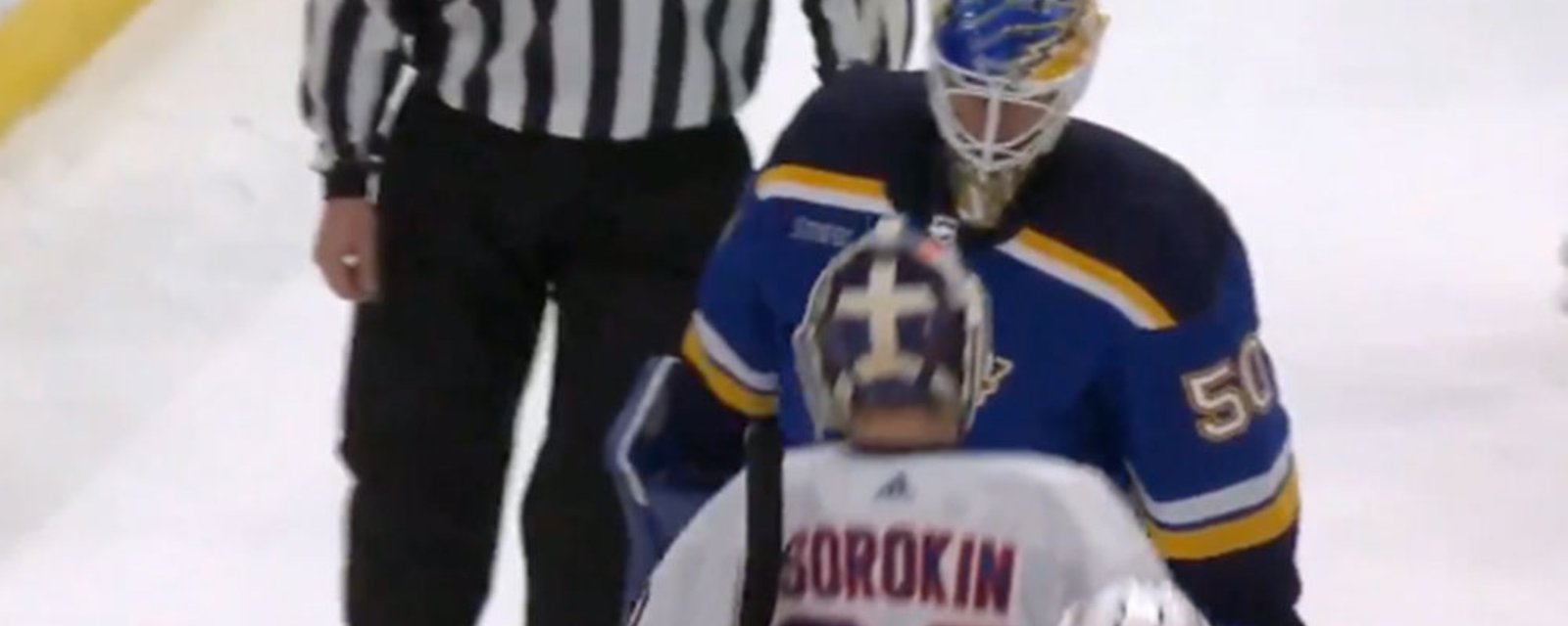 Jordan Binnington hits Ilya Sorokin with a legit body check as they head off the ice
