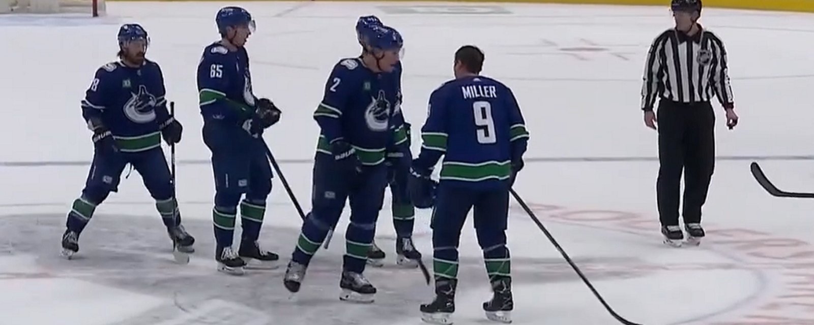 Teammates J.T. Miller and Luke Schenn get heated on the ice.