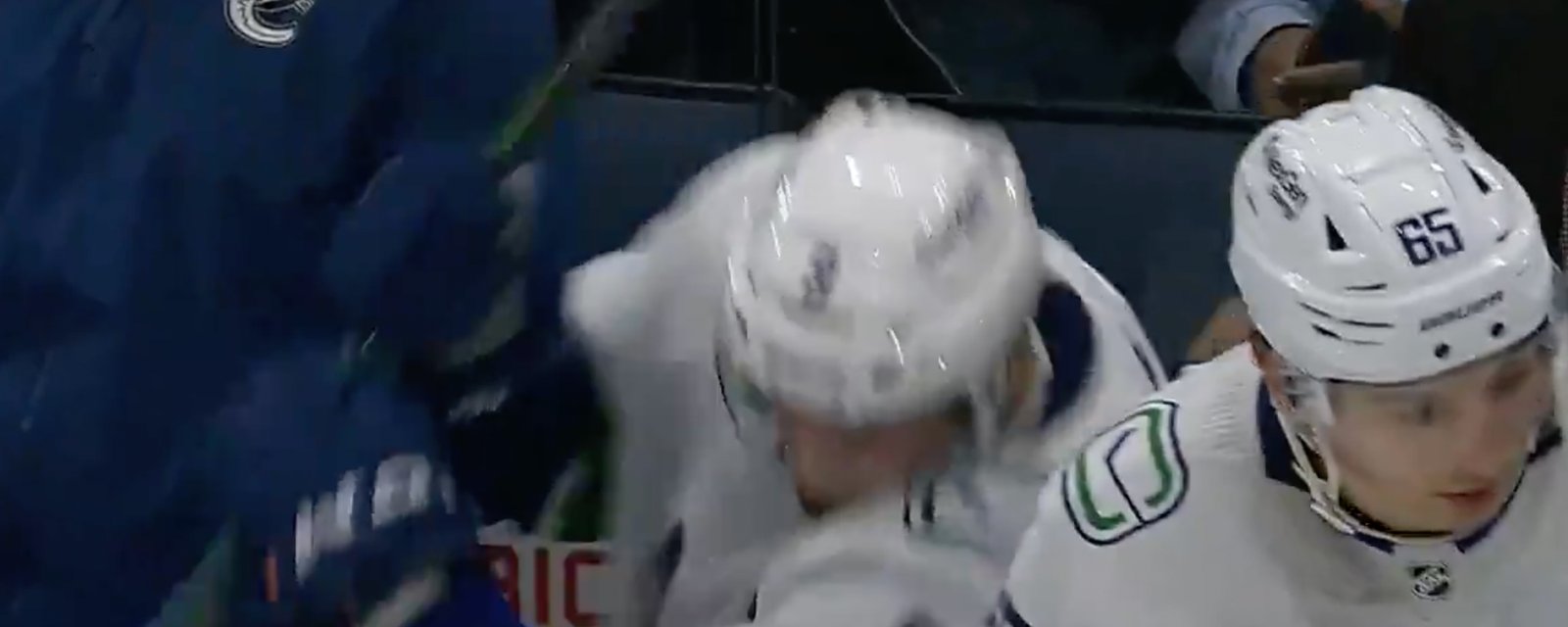 JT Miller flips out at the bench, slams his stick and screams at teammates