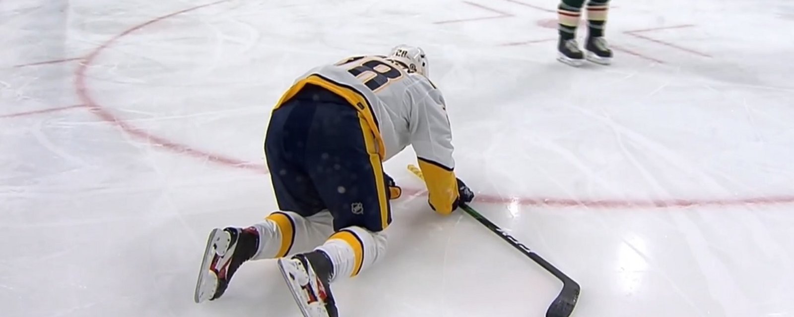 Tolvanen knocked out of the game after his head is pancaked into the boards.