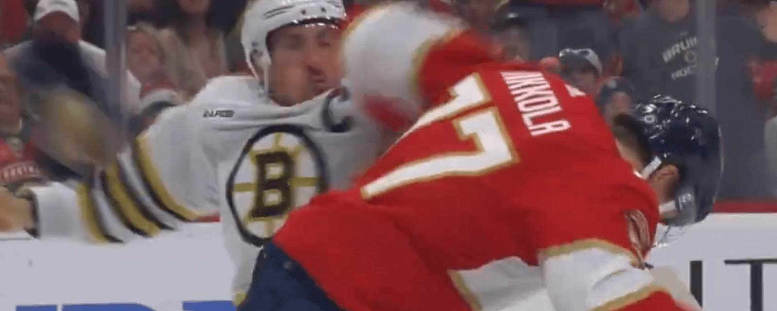Brad Marchand fights an opponent twice his size! 