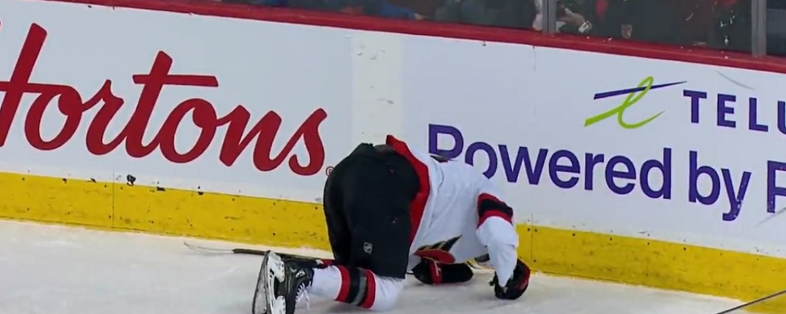 Mathieu Joseph screams in pain after being hit by Tyler Toffoli.