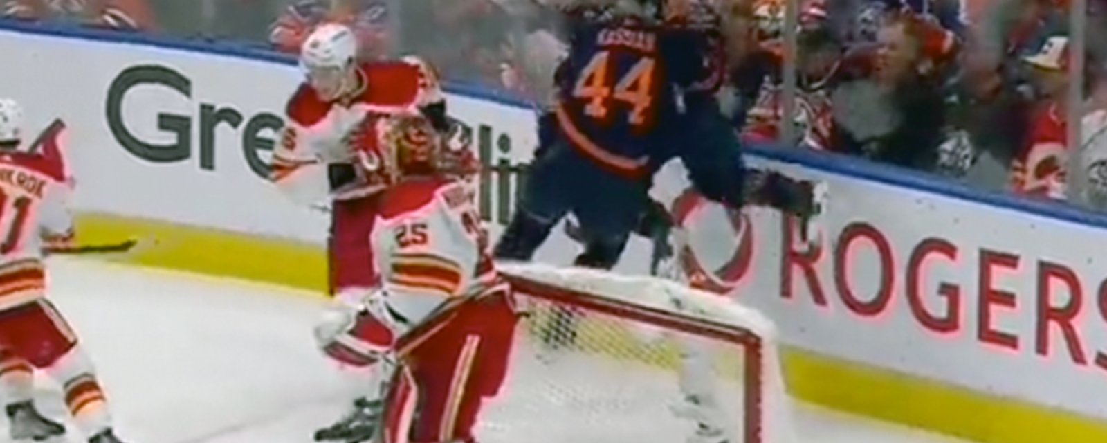 Oilers teammates Kassian and Archibald line each other up and absolutely smash each other behind Flames net