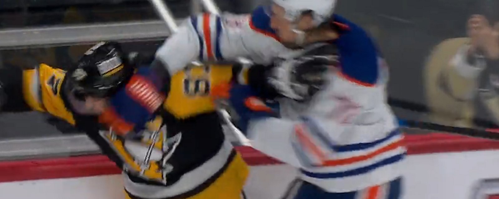 Vincent Desharnais mauls Sidney Crosby late in the 3rd.