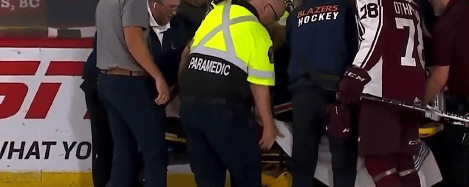 Wild prospect Kyle Masters 'seriously hurt,' carried out on stretcher.