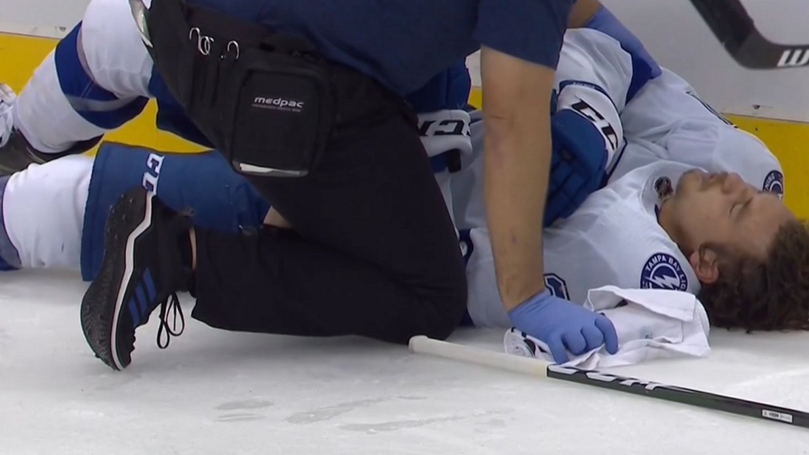 Yanni Gourde laid out after a brutal hit from Nick Ritchie.