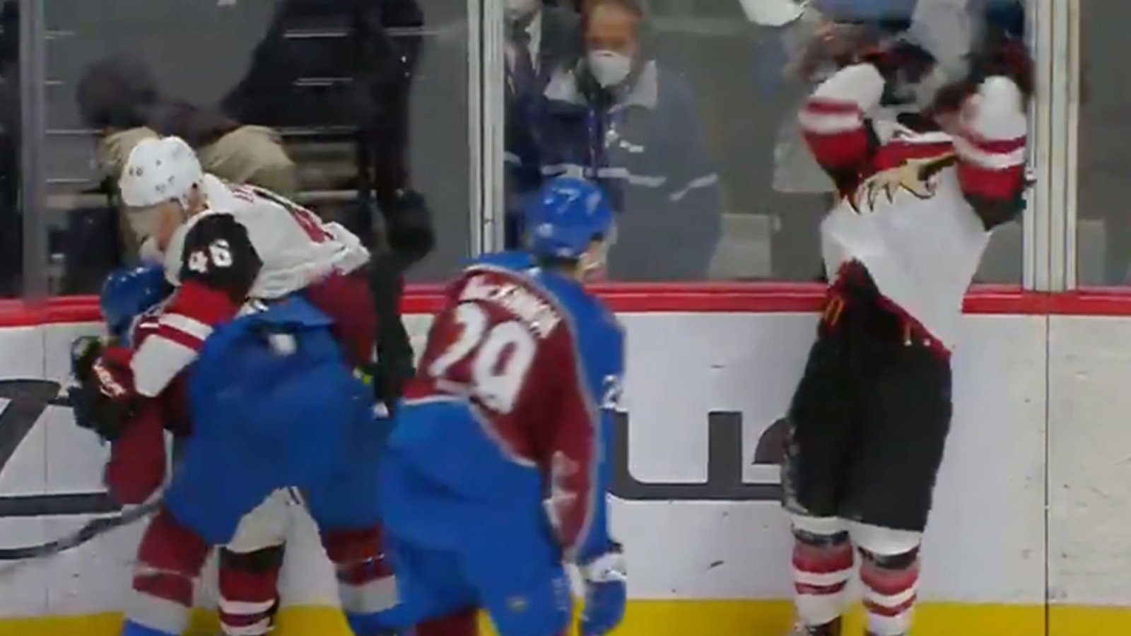 MacKinnon absolutely loses it, throws helmet at Garland's face