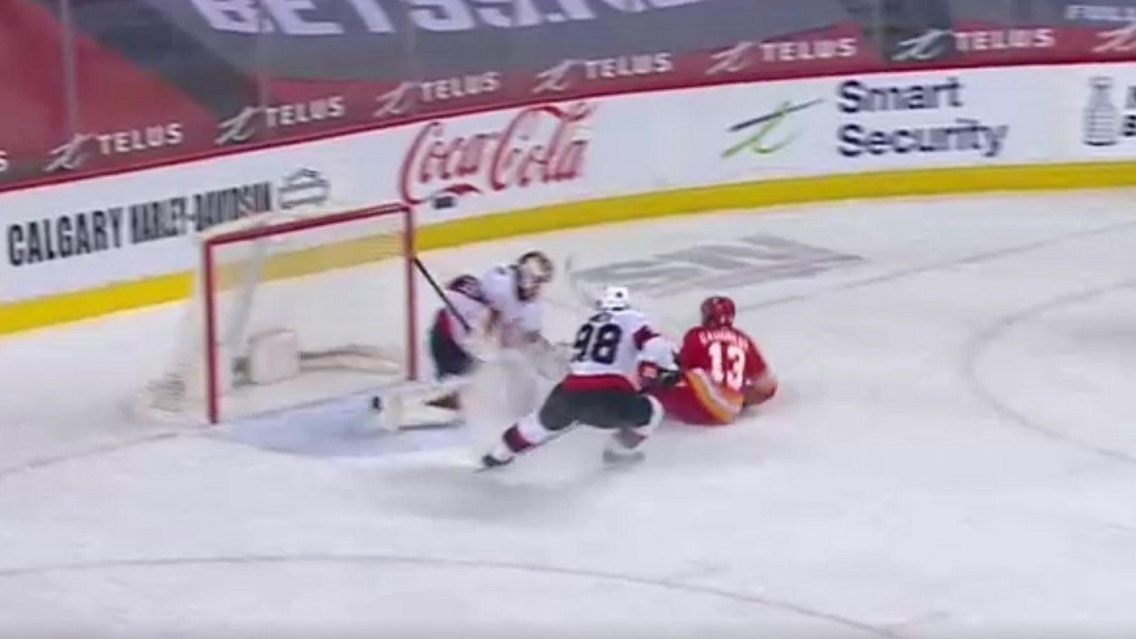 Johnny Gaudreau scores from his backside on the breakway.