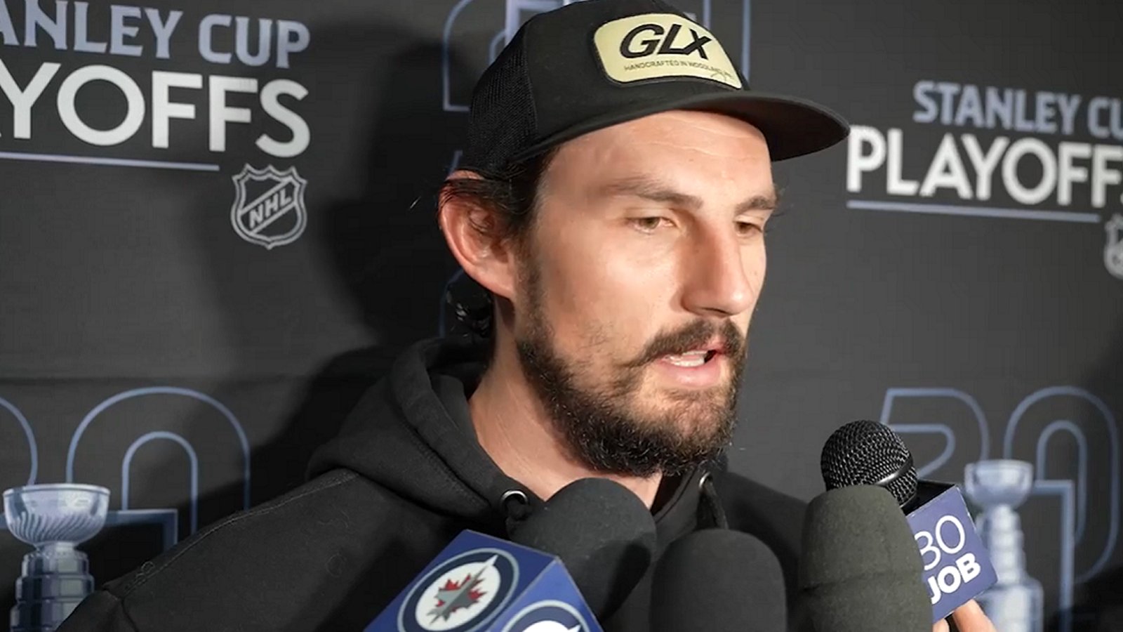 Connor Hellebuyck responds to choking allegations after Game 4.