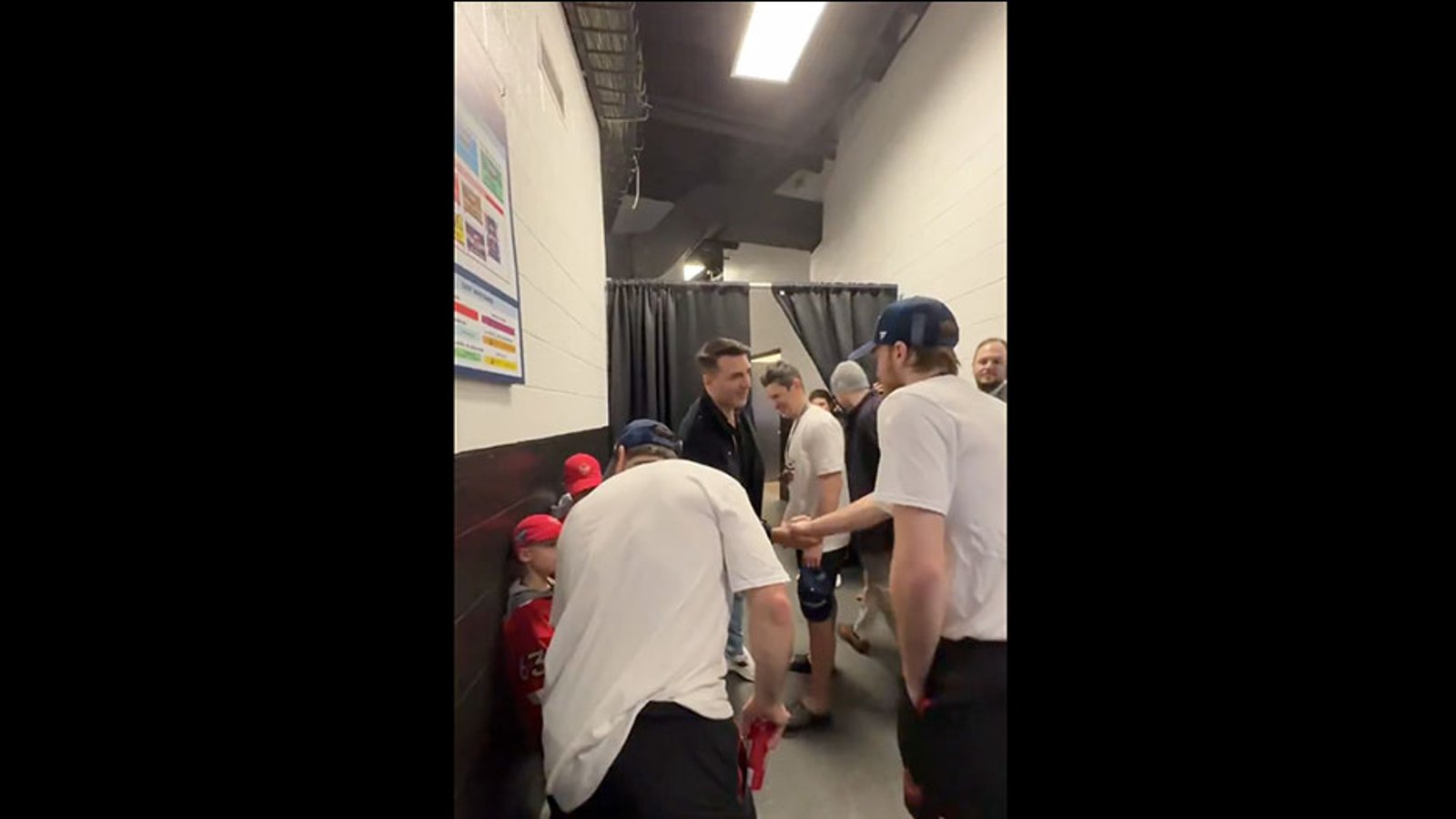 Crosby, McDavid and Marchand put their celebration on hold to meet Patrice Bergeron and his young sons