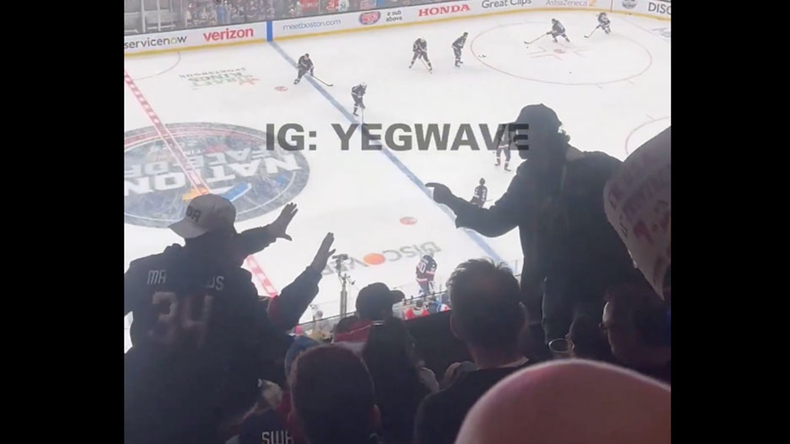 A crowd fight nearly breaks out after American fans take exception to Canadian fans' sign