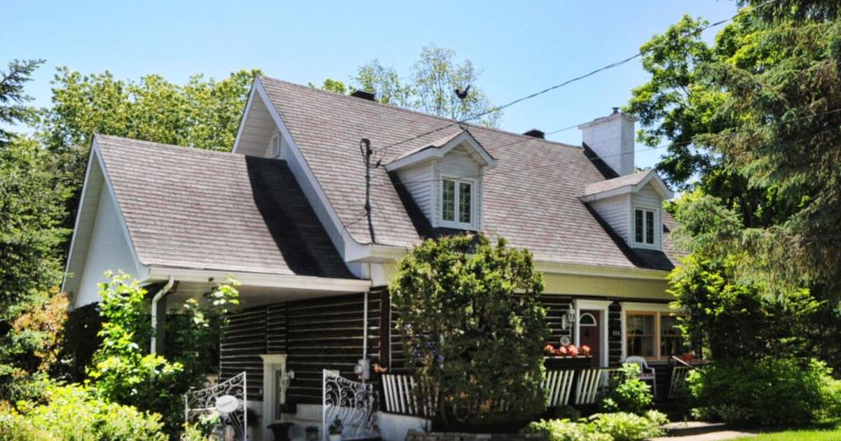 Magnifique maison de bois rond au coeur de Saint-Sauveur - Les Maisons