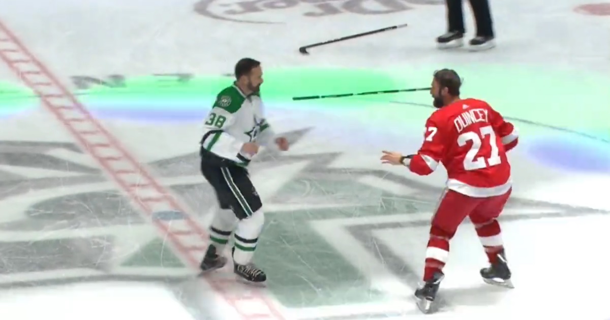 Vern Fiddler and Kyle Quincey drop the gloves during an alumni game.