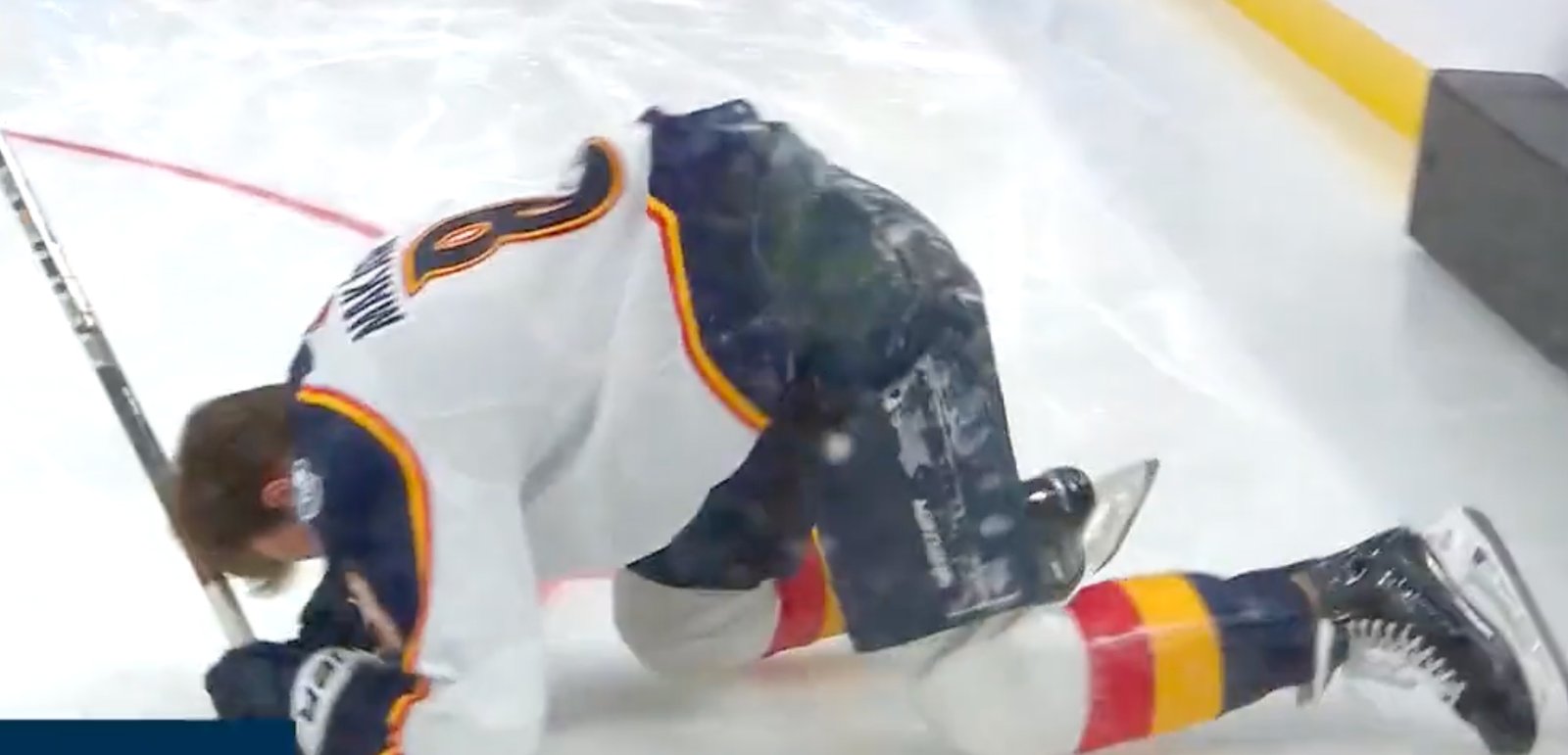 Cale Makar wipes out and crashes into the boards during Fastest Skater competition