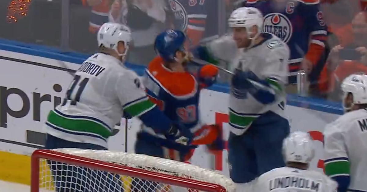Canucks face suspension over cross-check to McDavid's face.
