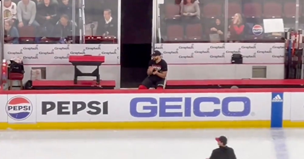 Nick Foligno sits on bench for the 1st intermission, watches his son skate in relay race 