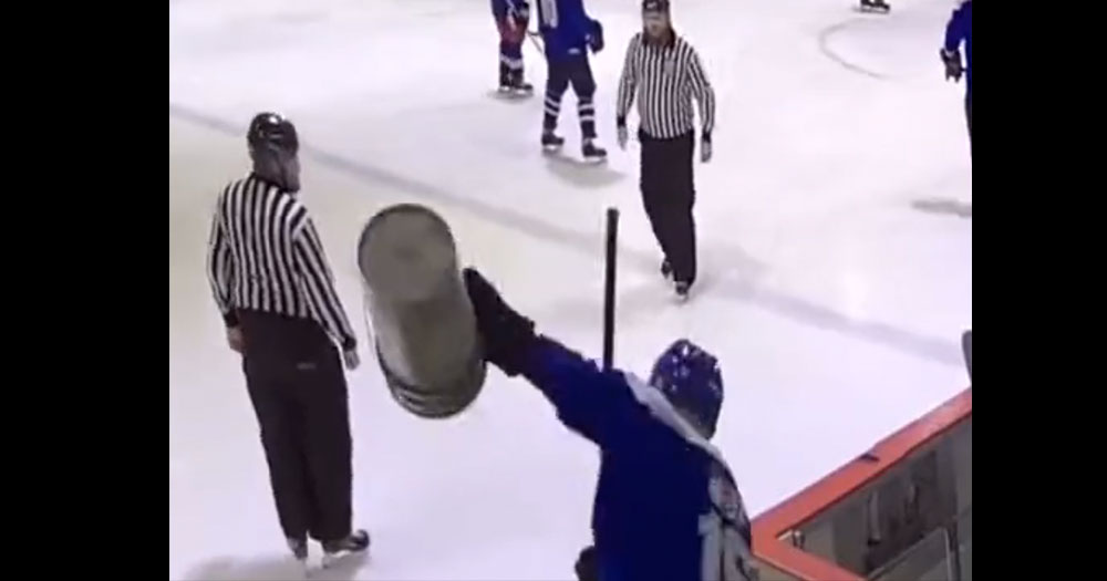 Beer leaguer throws a temper tantrum, chucks pucks on the ice in protest