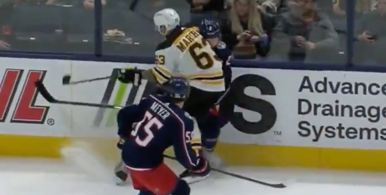 Brad Marchand injures Andrew Peeke with huge hit to the head!