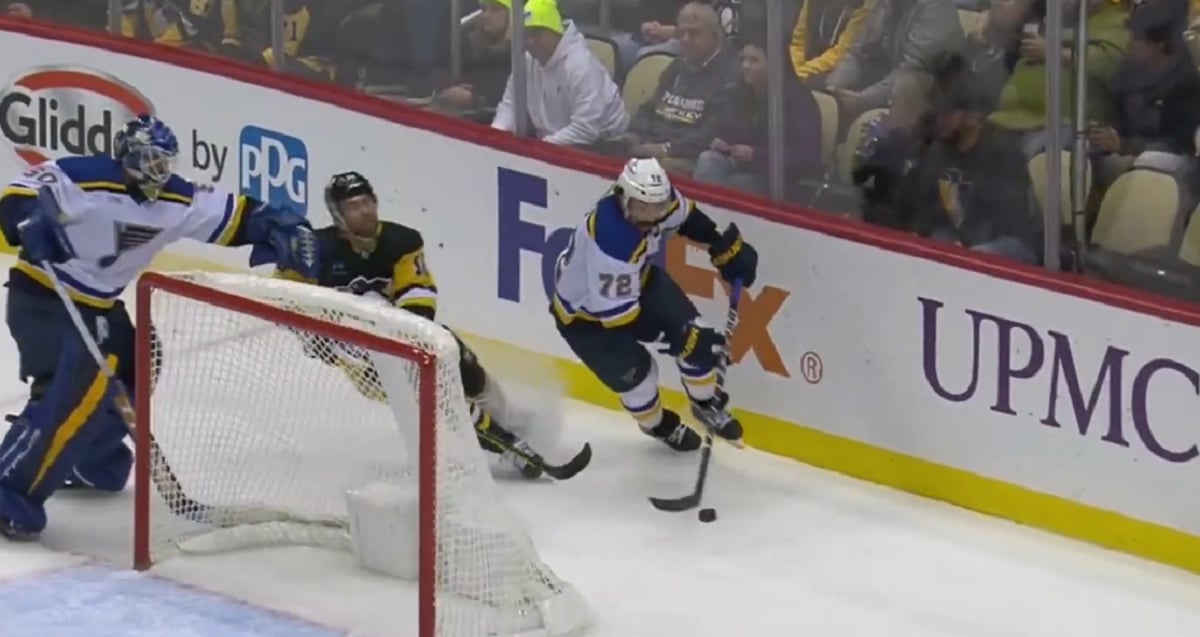 Jordan Binnington hits Jason Zucker in the face.