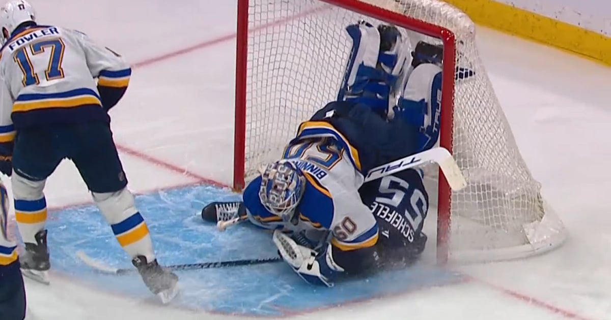 Mark Scheifele slams into Jordan Binnington in Game 2.