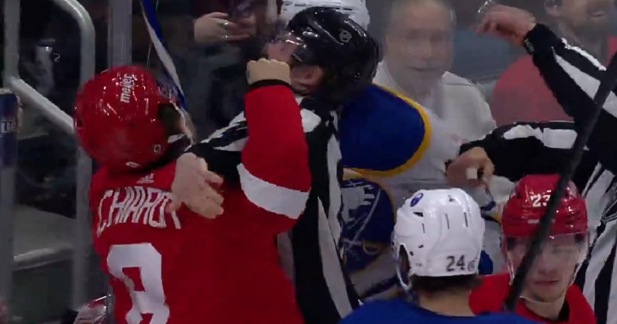 Linesman catches punch from Chiarot intended for Greenway.