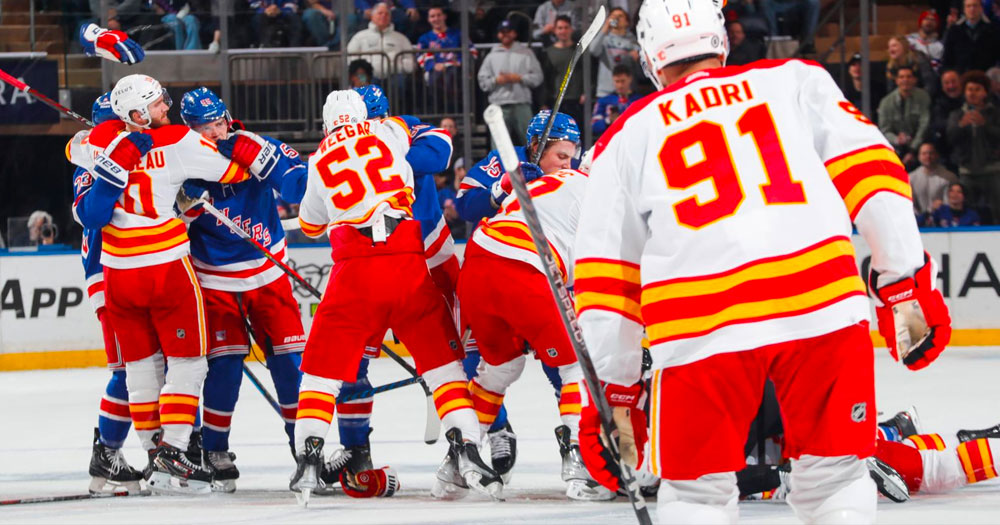 Both Kadri and Lucic get blown up with huge open ice hits