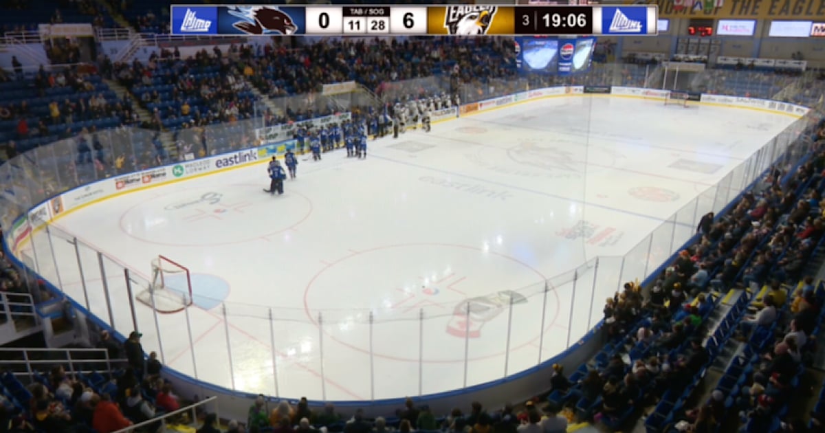 Head coach rushed to hospital after collapsing in 3rd period.