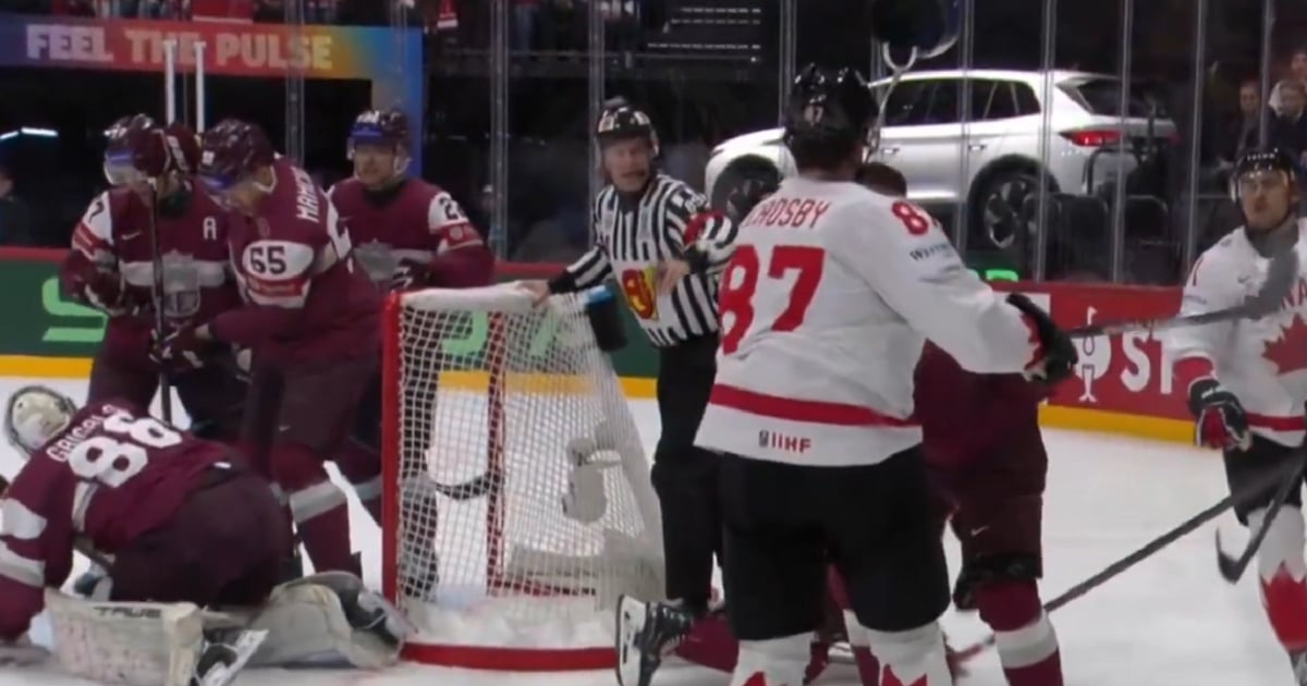 Sidney Crosby punches a players helmet off at World Championship.