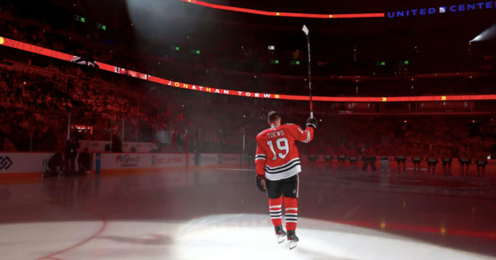 An emotional Jonathan Toews salutes the crowd in his final game as a Blackhawk