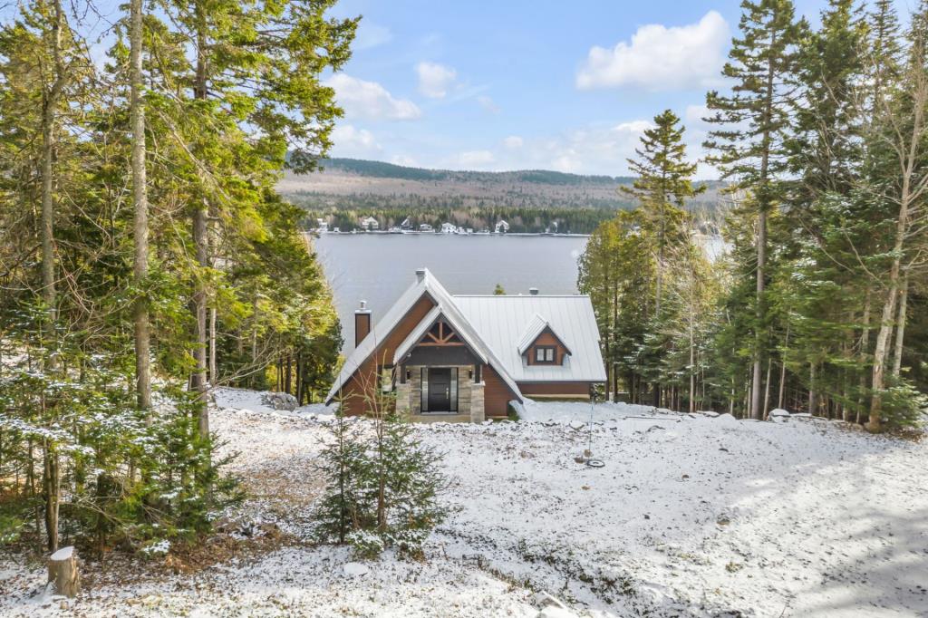 Résidence au charme unique avec vue panoramique sur l'eau