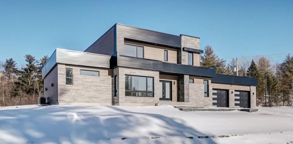 5 chambres, espace à profusion, fenestration généreuse: découvrez tous les attraits de ce bijou clés en main